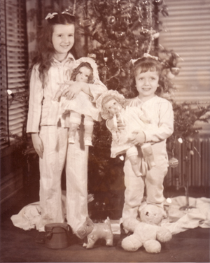 Marilyn and Mickey with dolls at Christmas